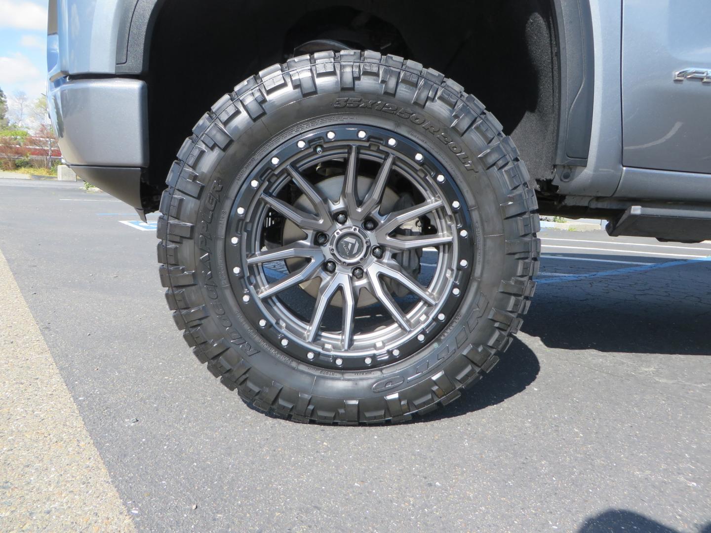 2019 CHARCOAL /BLACK GMC Sierra 1500 AT4 Crew Cab Long Box 4WD (1GTP9EEL6KZ) with an 6.2L V8 OHV 16V engine, 6A transmission, located at 2630 Grass Valley Highway, Auburn, CA, 95603, (530) 508-5100, 38.937893, -121.095482 - Dont miss this AT4 featuring a 4" RC lift kit kit, 35" Nitto Ridge Grappler tires, 20" Fuel Rebel wheels, Amp POwer steps, Air Bags, and a Tyger Bed cover. - Photo#8